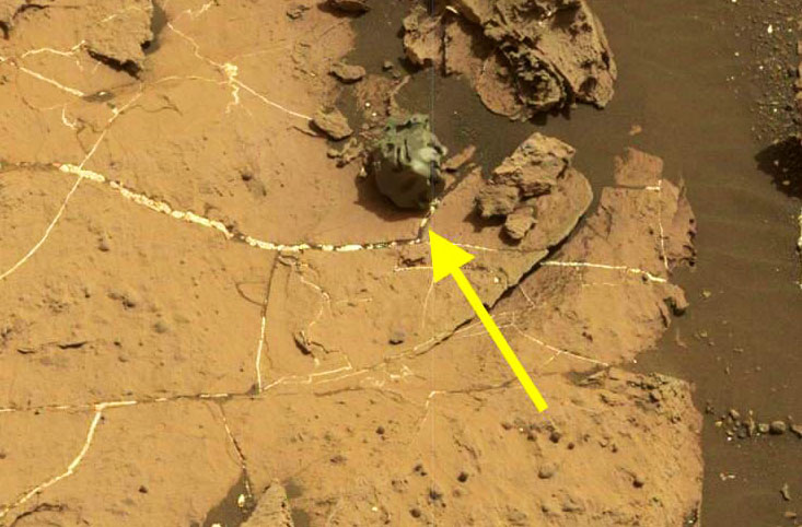 Martian Rover Finds Smooth Metallic 'Meteorite' with 'Grooves'