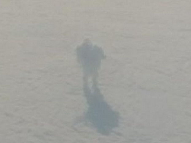Plane Passenger Captures 'Giant Robot' Standing on Clouds