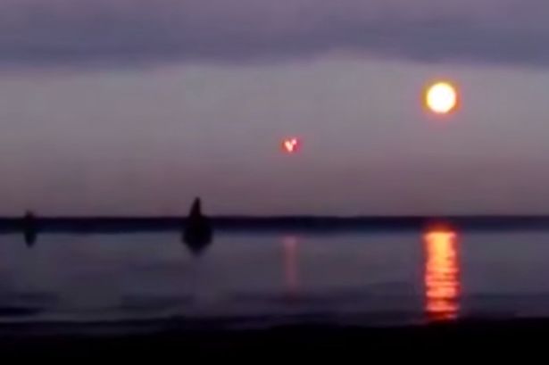 Mysterious UFO Cluster Filmed Over Baltic Sea