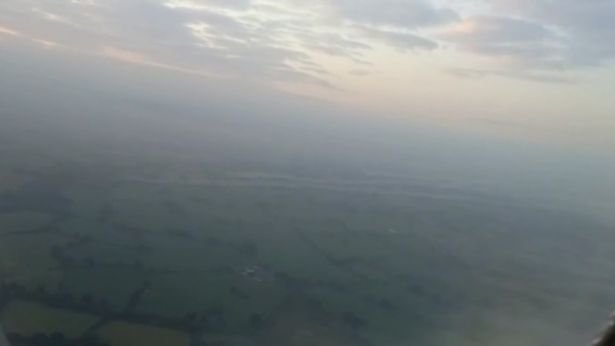 'UFO' Filmed in Skies Above Manchester as Plane Takes Off