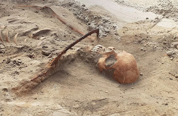 'Vampire' Grave Unearthed with Sickle Across Skeleton's Neck