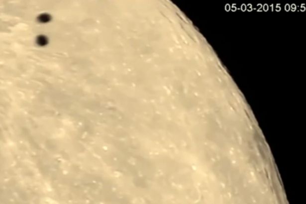 Double 'UFO' Shadows Captured Flying Across the Moon