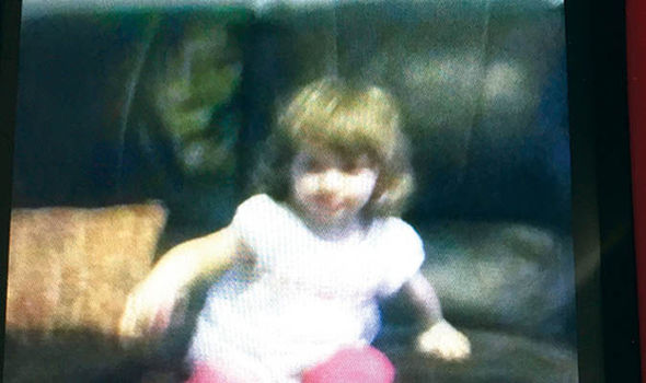 Ghostly 'Witch Face' Captured on Camera Behind Young Girl