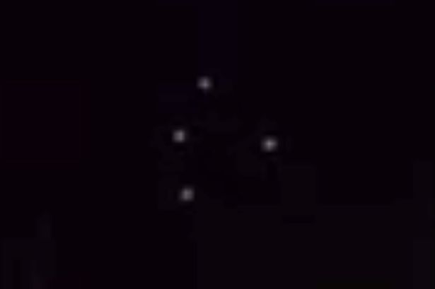 Footage of 'Black Triangle' UFO Shows Lights Drifting Over City