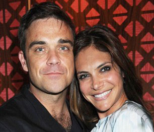 Robbie Williams Calls in 'Healer' to Purge Ghost of Michael Winner