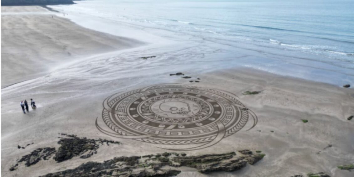 Brewery Creates Sand Pattern Mystery on Beach for Halloween