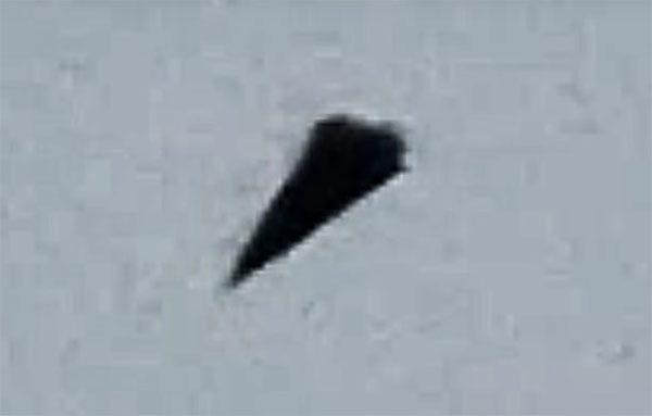 Strange Black Triangular 'UFO' Filmed Floating over German City