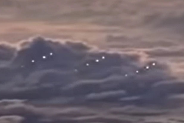 Airliner Pilot Video Shows Twelve 'UFOs' Flying in Formation