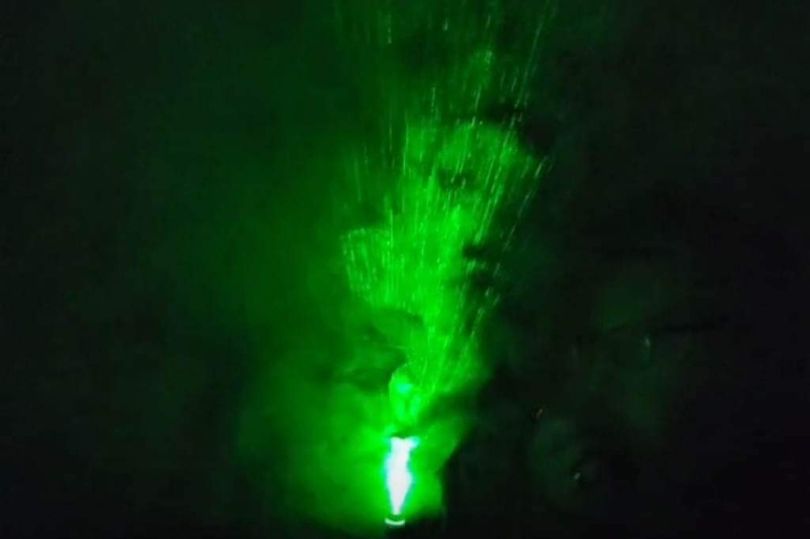Ghost Hunters Capture 'Face of Spirit' with Smoke and Lasers