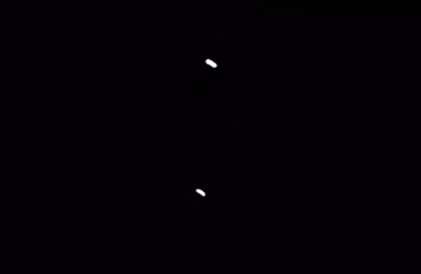 Boeing Pilot Takes Video of Hovering Lights in the Sky