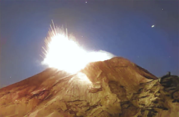 'UFO' Filmed Flying Towards Volcano Moments Before Eruption