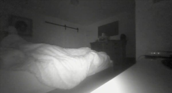 Daughter Shares Video of Dad Being 'Tucked in by a Ghost'