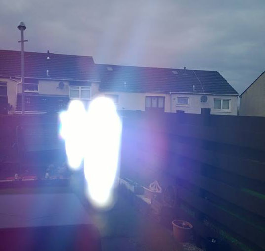 'Family from Beyond the Grave' Appear in Phone Camera Image