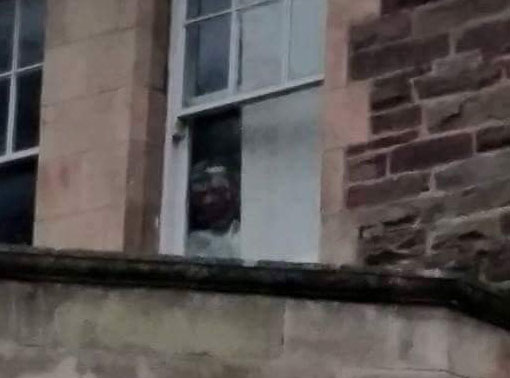 Photo Reveals 'Ghost of Former Patient' in Window of Derelict Asylum