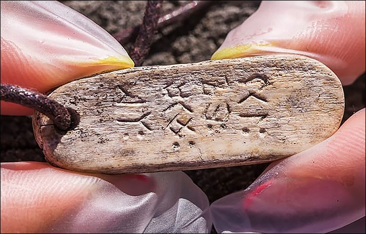 Boy Finds Ancient Runic Message on Mammoth Bone Pendant