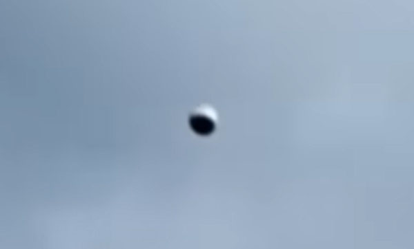 'Odd Metallic Orb' Filmed over Colombian Village