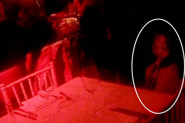 'Black-Eyed Ghost' of Christmas Appears in Party Snap